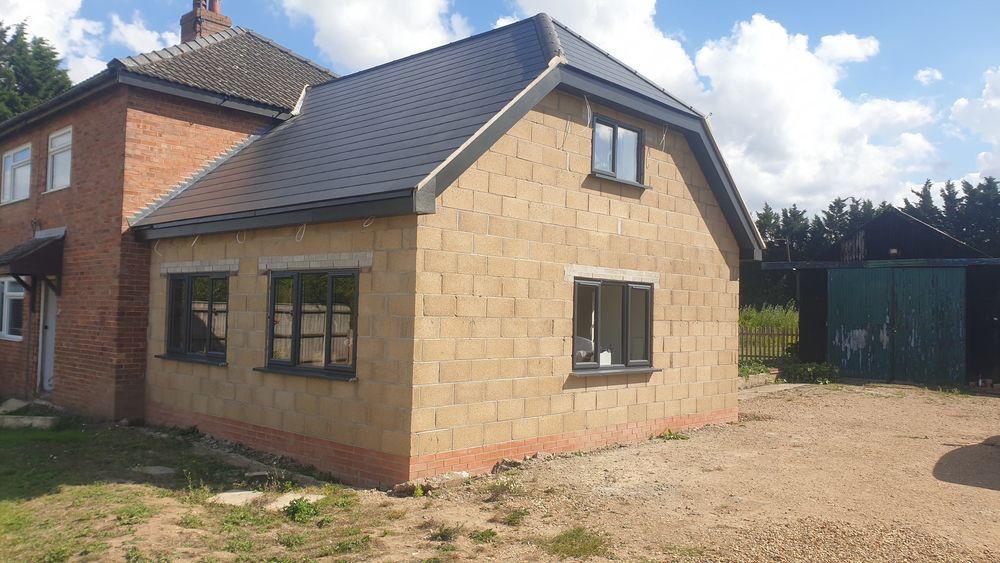 Blockwork walls going up on a home extension in progress | home extensions in King's Lynn by Humphries Construction