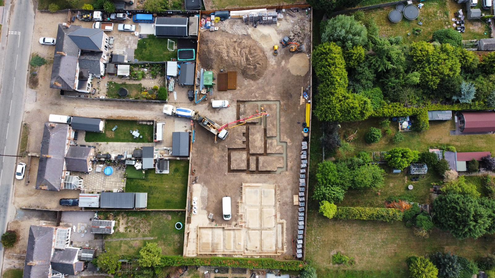 Aerial view of a new-build groundworks site with foundation slab and blockwork | new build groundworks in King's Lynn by Humphries Construction
