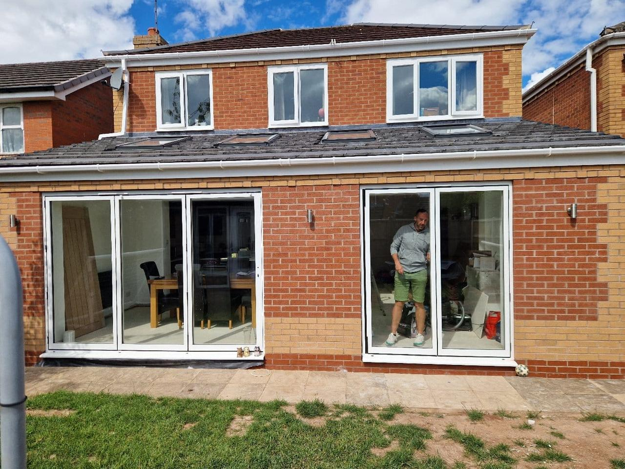 Finished two-storey rear extension with bifold doors and pitched tiled roof | home extensions in King's Lynn by Humphries Construction