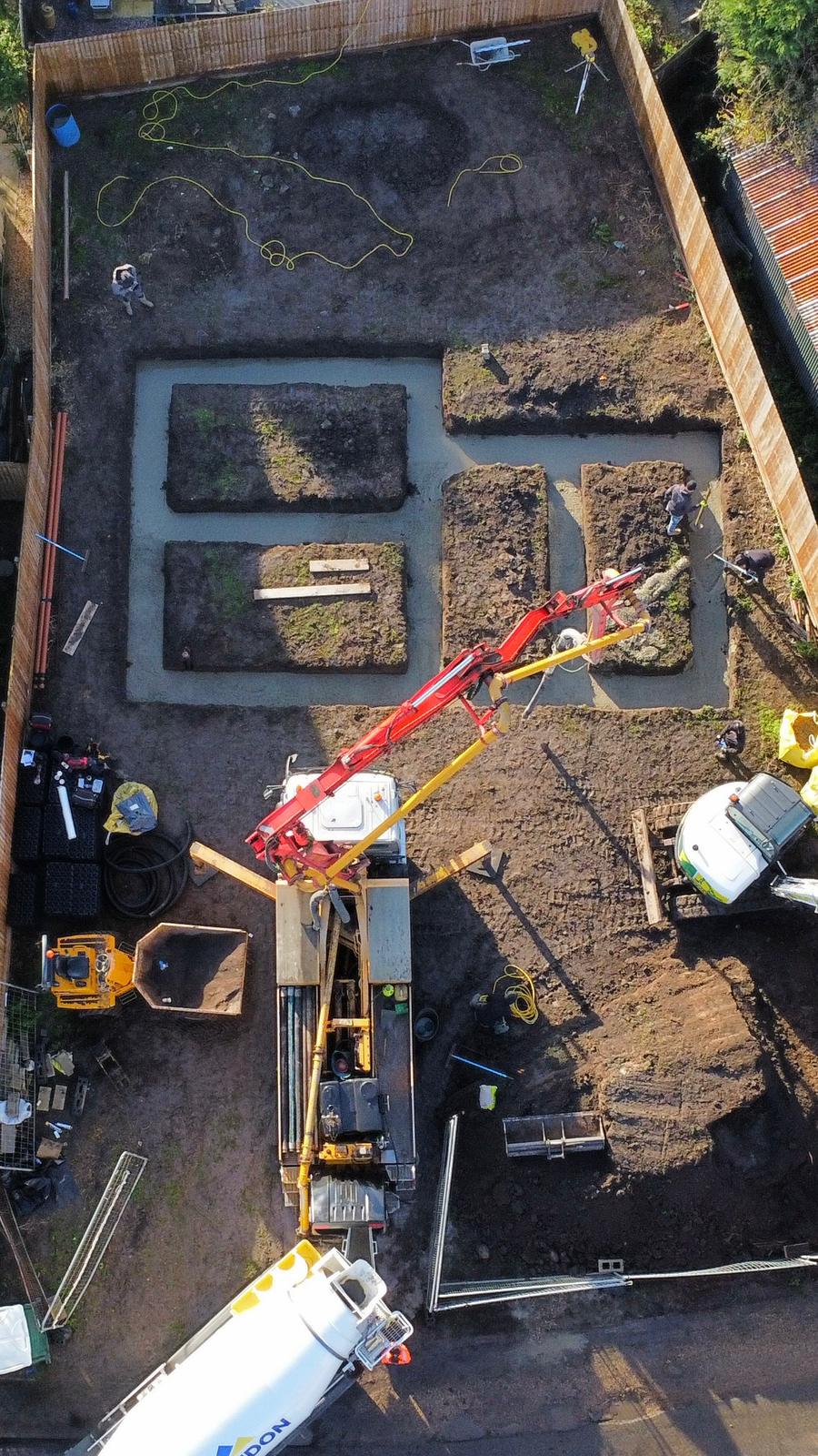 Aerial view of a live concrete pour on a new-build slab | new build groundworks in King's Lynn by Humphries Construction